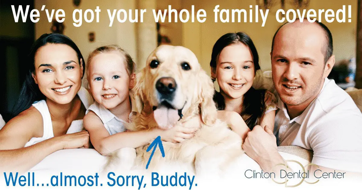 Family with their dog, all smiling