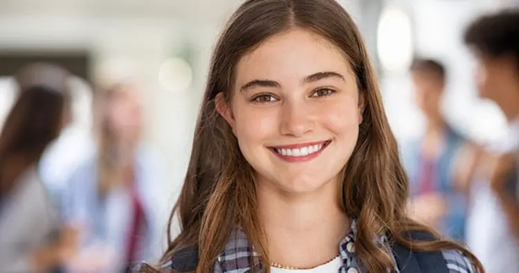Portrait of beautiful girl with affordable braces near macomb township mi.