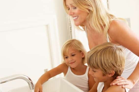 child brushing teeth
