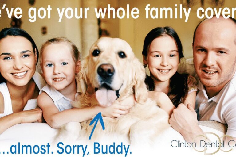 Family with their dog, all smiling